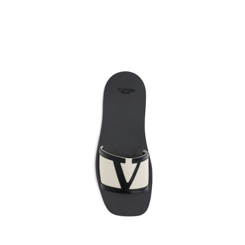 Valentino Garavani Viva Superstar in White and Black Leather Slide Sandals