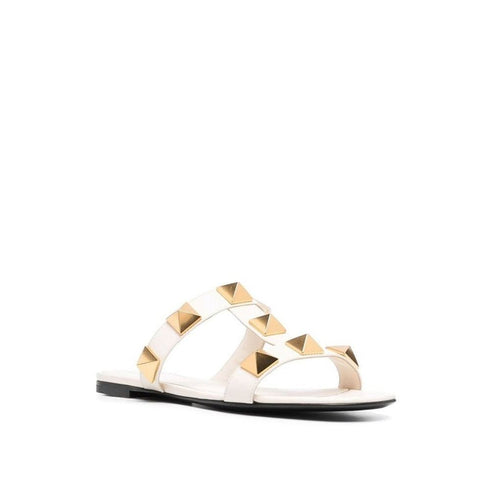 Valentino Garavani Women's White Roman Stud Flat Sandals in Calf Leather