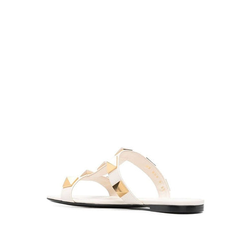 Valentino Garavani Women's White Roman Stud Flat Sandals in Calf Leather