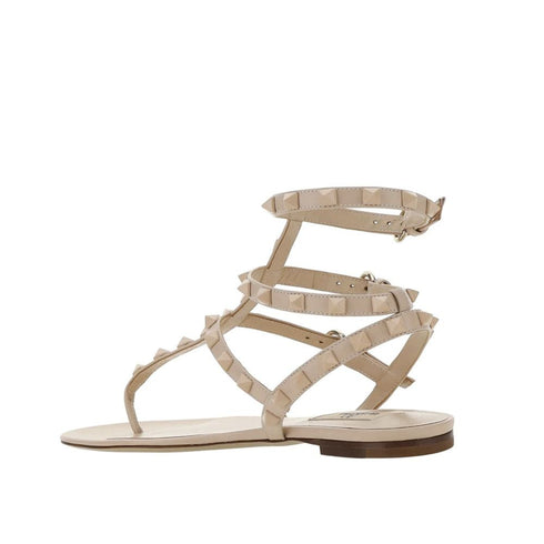 Valentino Garavani Rockstud Flip-Flop Sandals – Beige Leather Flat Sandals for Women