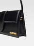 Jacquemus Le Bambino Long Shoulder Bag in Black Leather with Gold Hardware for Women