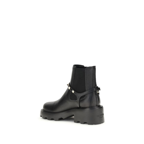 Valentino Garavani Black Leather Ankle Boots with Studded Strap – Women’s